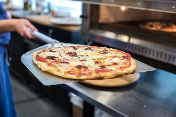 Comment Ouvrir une Pizzeria : Recettes du Succès dans la Restauration